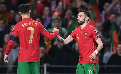 Bruno Fernandes (right) celebrates his opening goal with Cristiano Ronaldo.