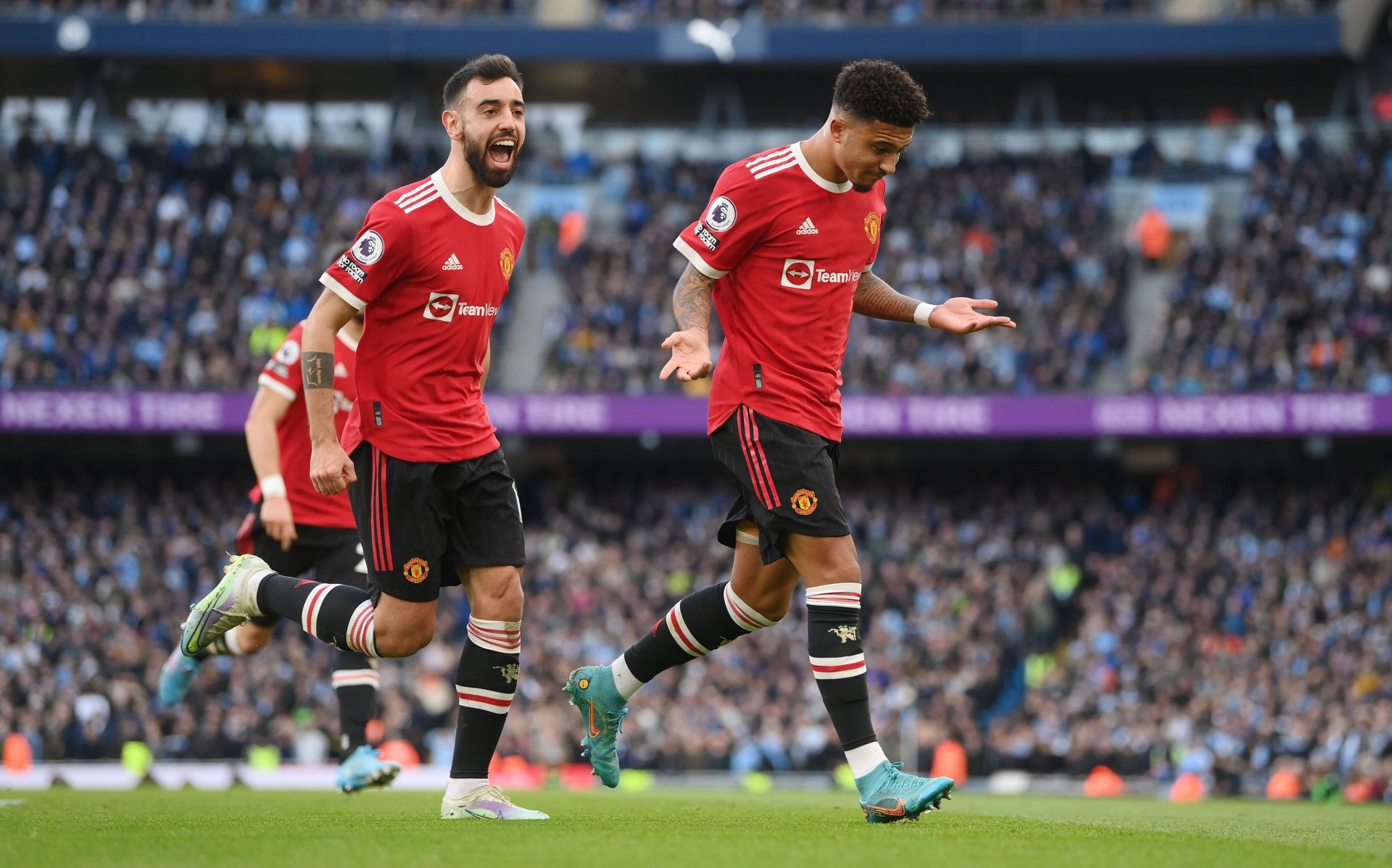 Jadon Sancho celebrates after scoring the goal