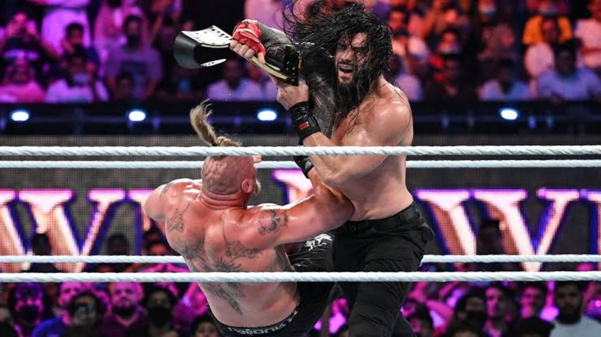 Roman Reigns and Brock Lesnar at Crown Jewel.