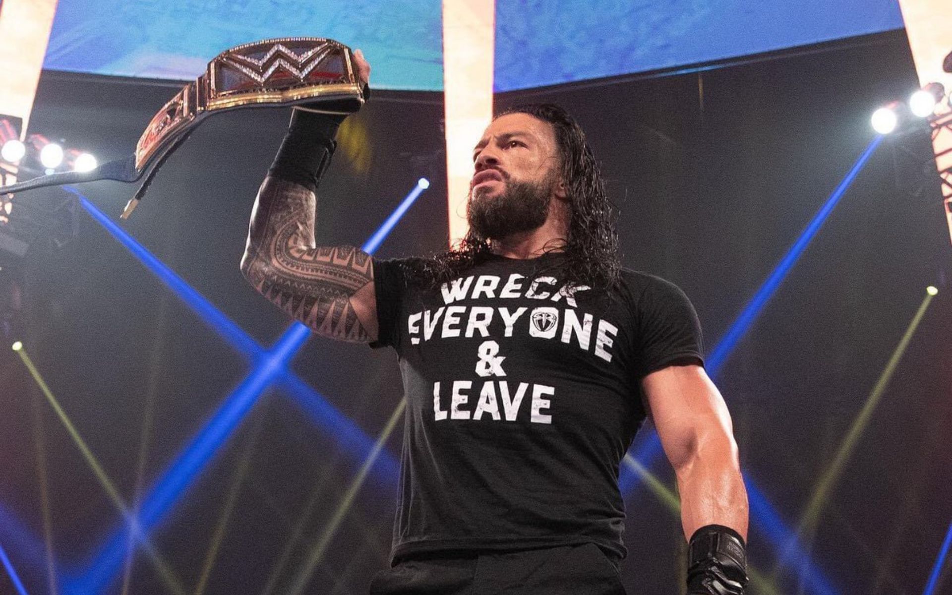 Roman Reigns poses with the Universal Title