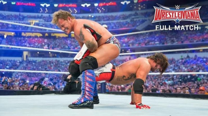 Chris Jericho performing Walls of Jericho on AJ Styles.