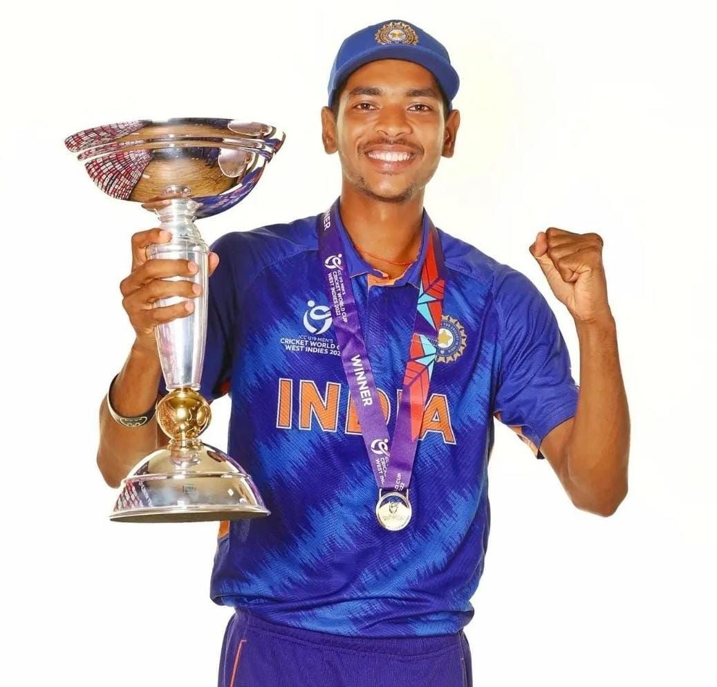 Ravi Kumar poses with the U19 World Cup trophy and winners medal [Credits: Ravi Kumar]
