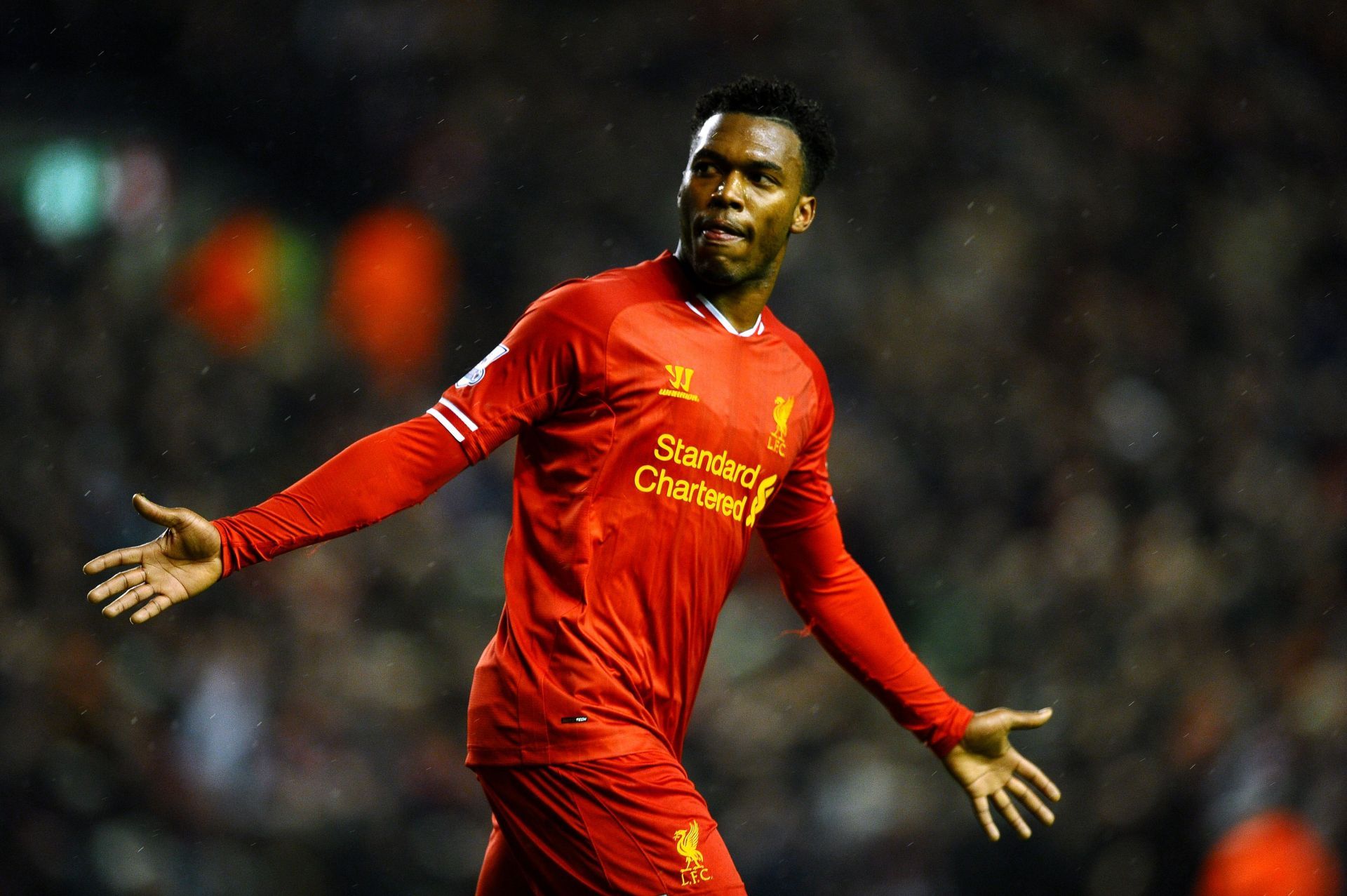 Sturridge celebrates his goal in the Merseyside derby