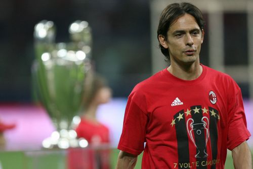 Filippo Inzaghi walks past the Champions League trophy after AC Milan's win in 2007.