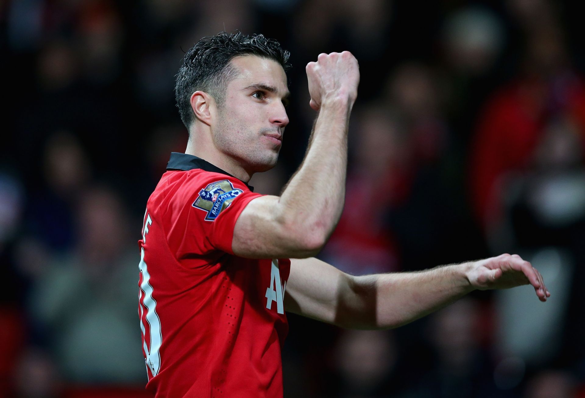 Robin van Persie celebrates a goal for Manchester United.