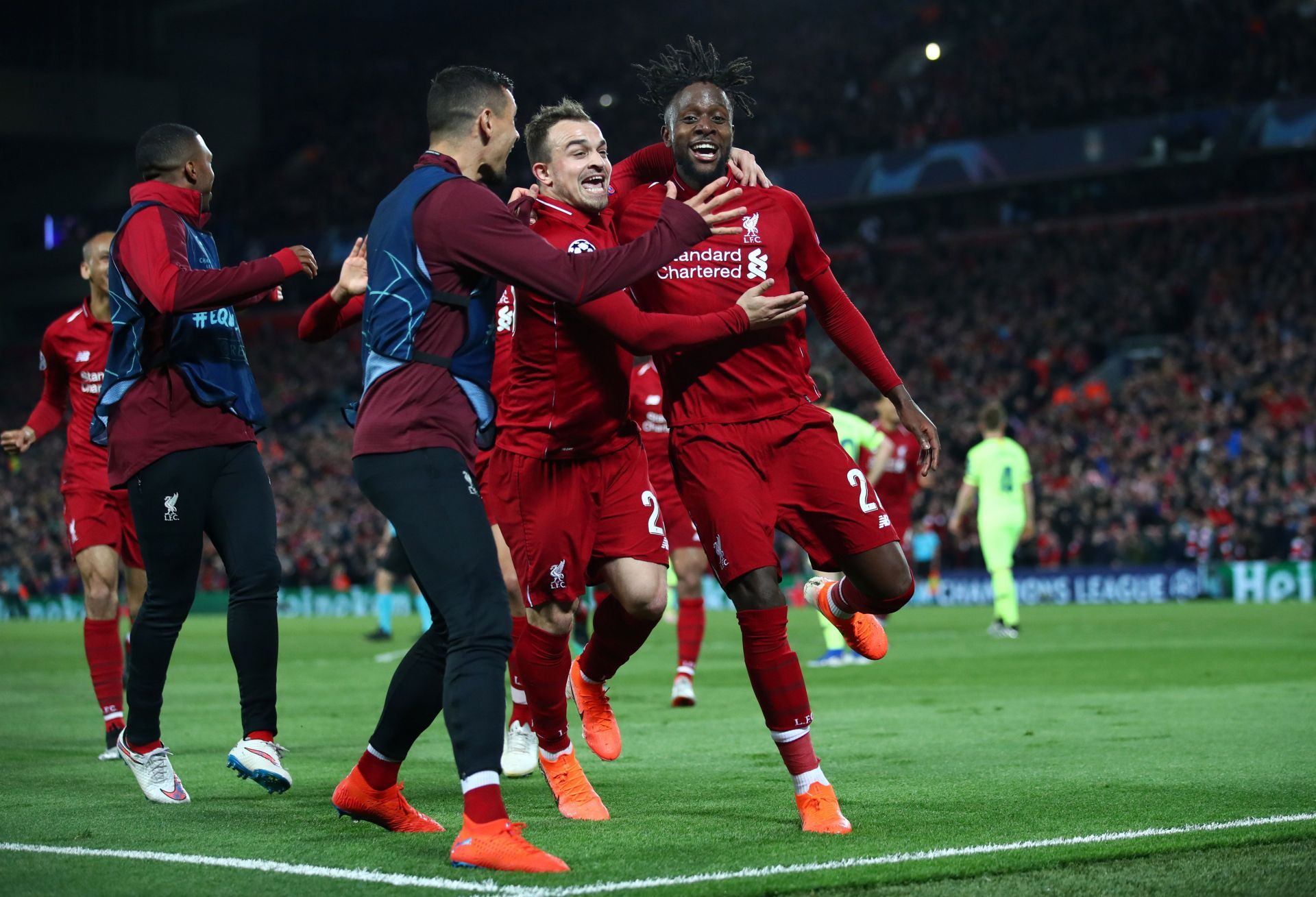 Origi (right) has become a hero at Anfield