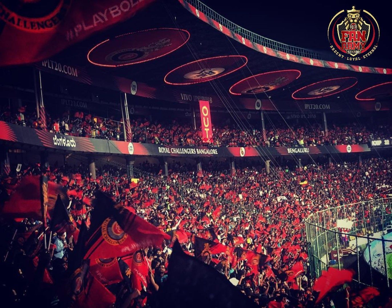 Fans in Chinnaswamy stadium painting the stadium red