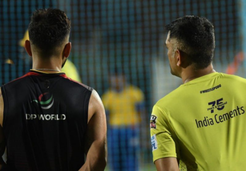 The legends have a chat during a practice session. Pic: RCB