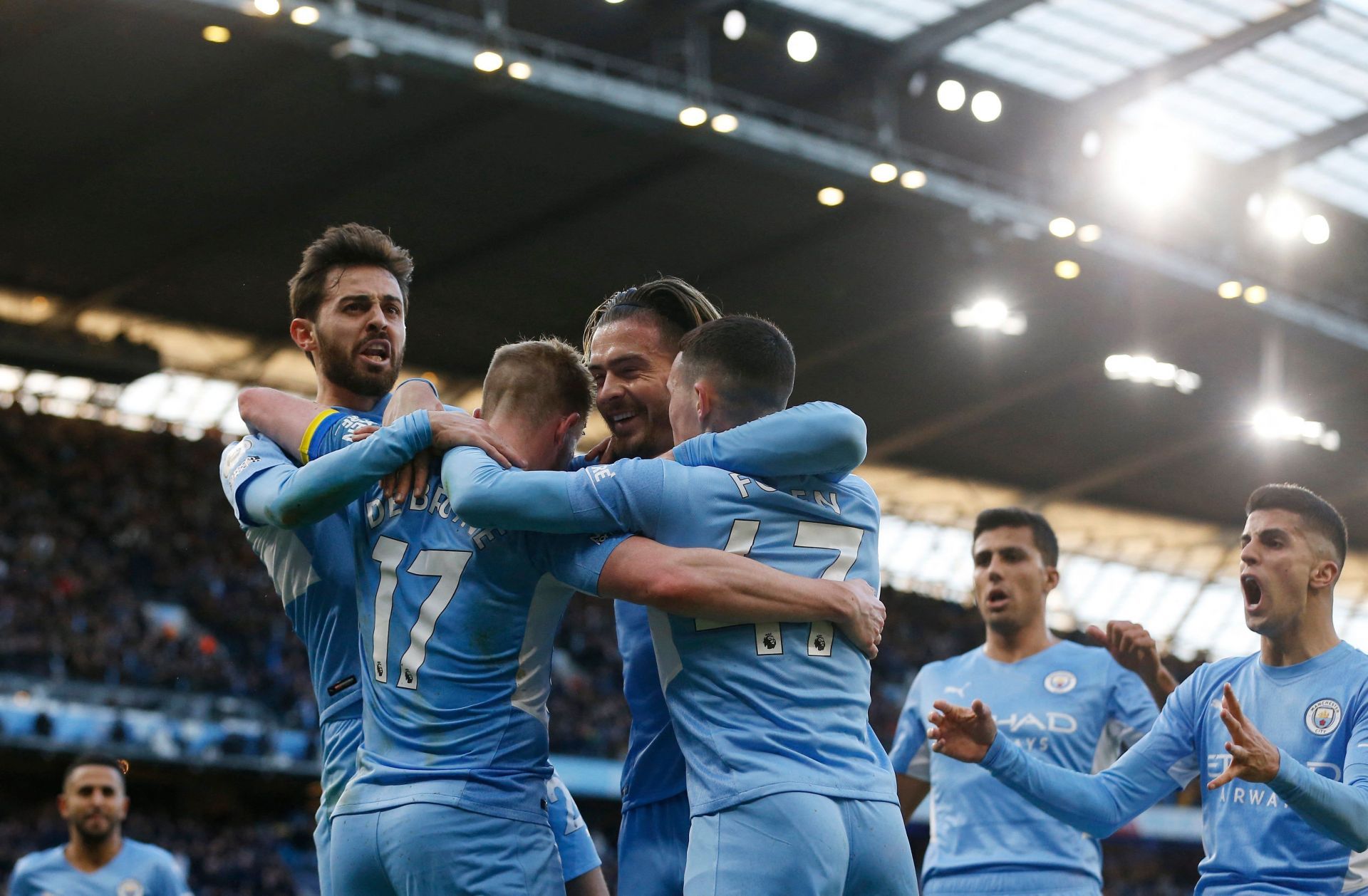 Manchester City players celebrate one of their goals