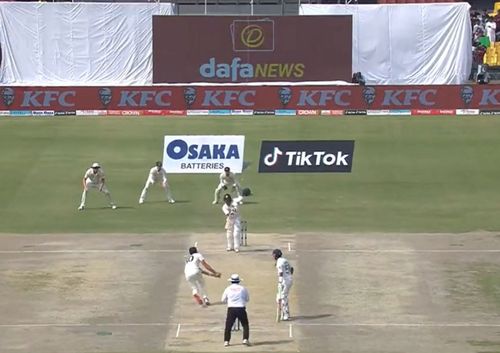 Australian skipper Pat Cummins reacted quickly to pluck a sharp return catch to send Azhar Ali packing (Screengrab via Twitter/ Pakistan Cricket)