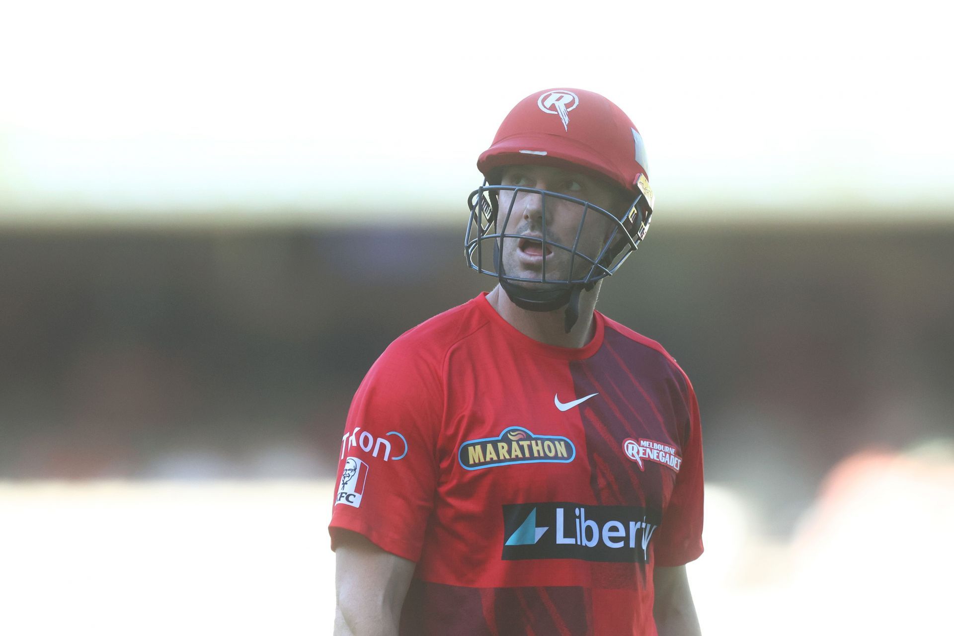 Melbourne Renegades sport a red and black kit in the Big Bash League