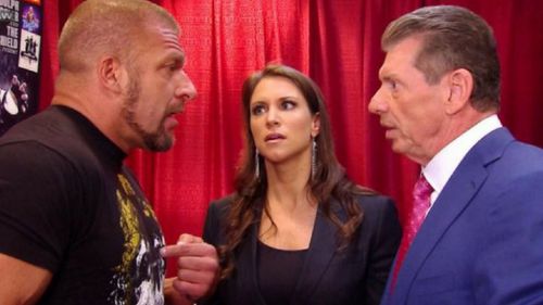 Triple H, Stephanie McMahon, and Vince McMahon