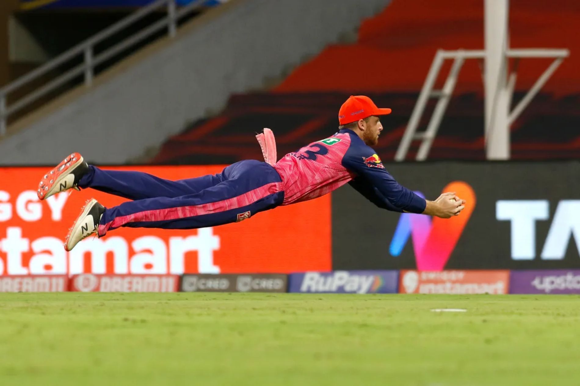 RR&rsquo;s Jos Buttler takes a superb diving catch to dismiss Daniel Sams in Match 9 against Mumbai Indians. The Englishman had earlier scored a 100 off 68 balls.