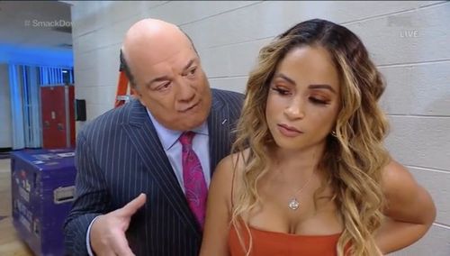 Heyman with Kayla Braxton during a backstage interview segment