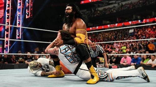 The Lion of WWE attacking The Mysterios