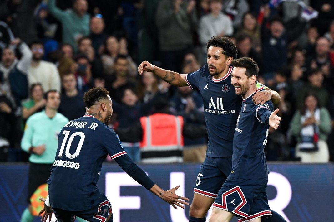 Neymar, Marquinhos and Lionel Messi celebrate after the Argentine put the hosts ahead.