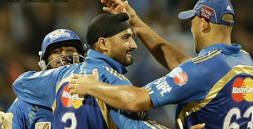 Harbhajan Singh and Andrew Symonds during the IPL. Pic: IPLT20.COM