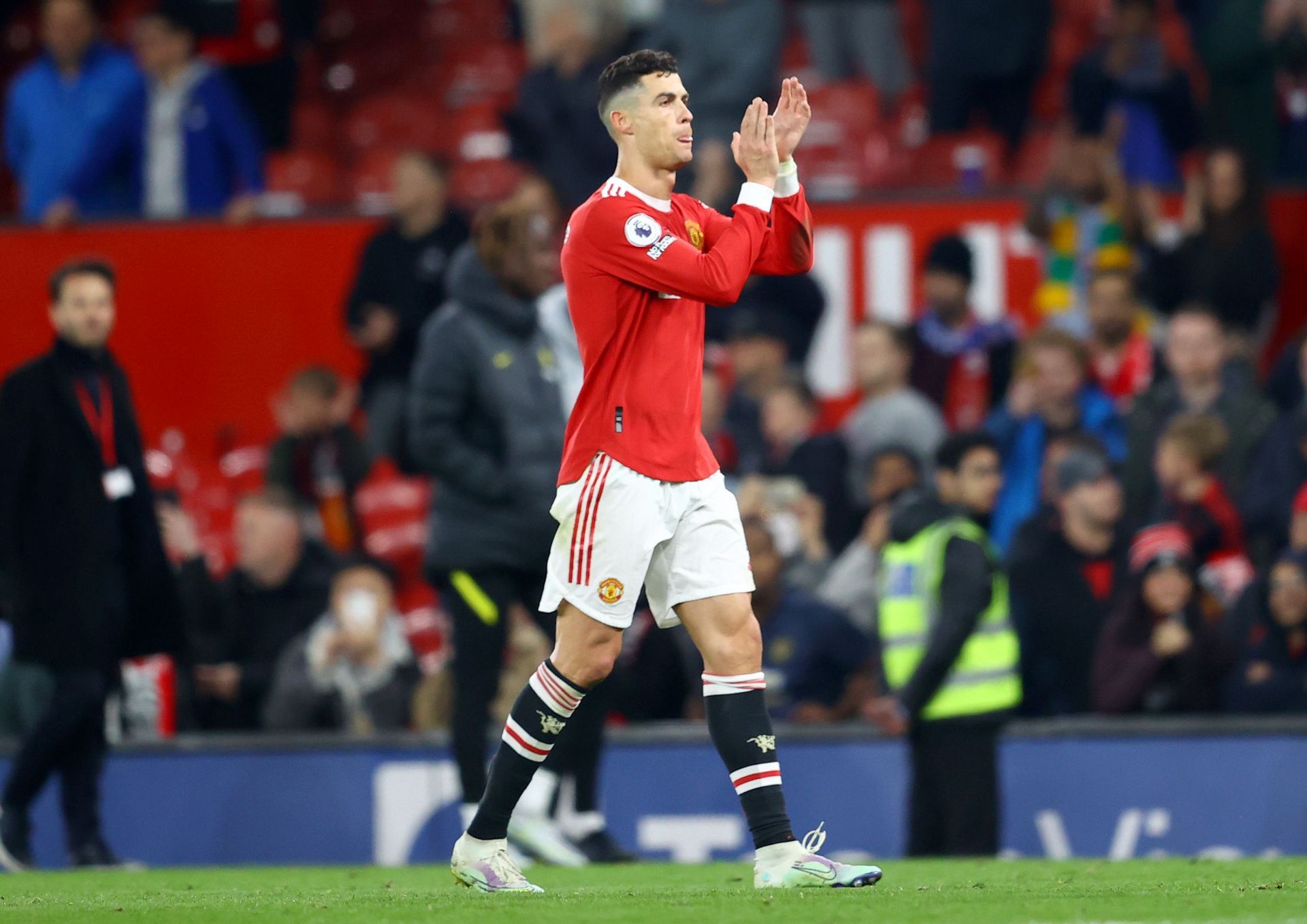 Cristiano Ronaldo applauds the fans at Old Trafford.