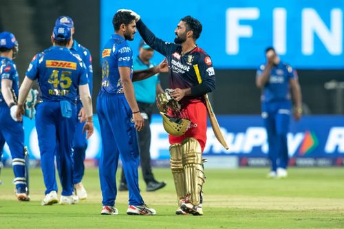 Dinesh Karthik (right) after RCB’s win over MI. Pic: IPLT20.COM