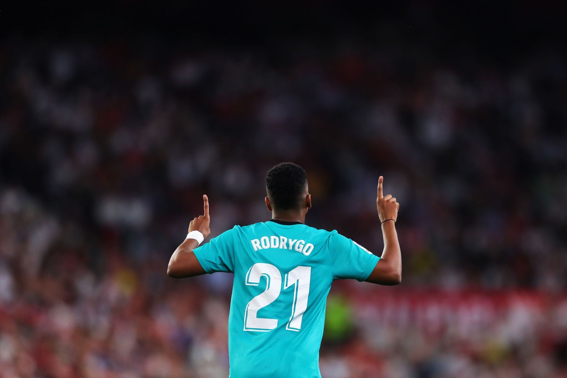 Rodrygo celebrates after scoring.