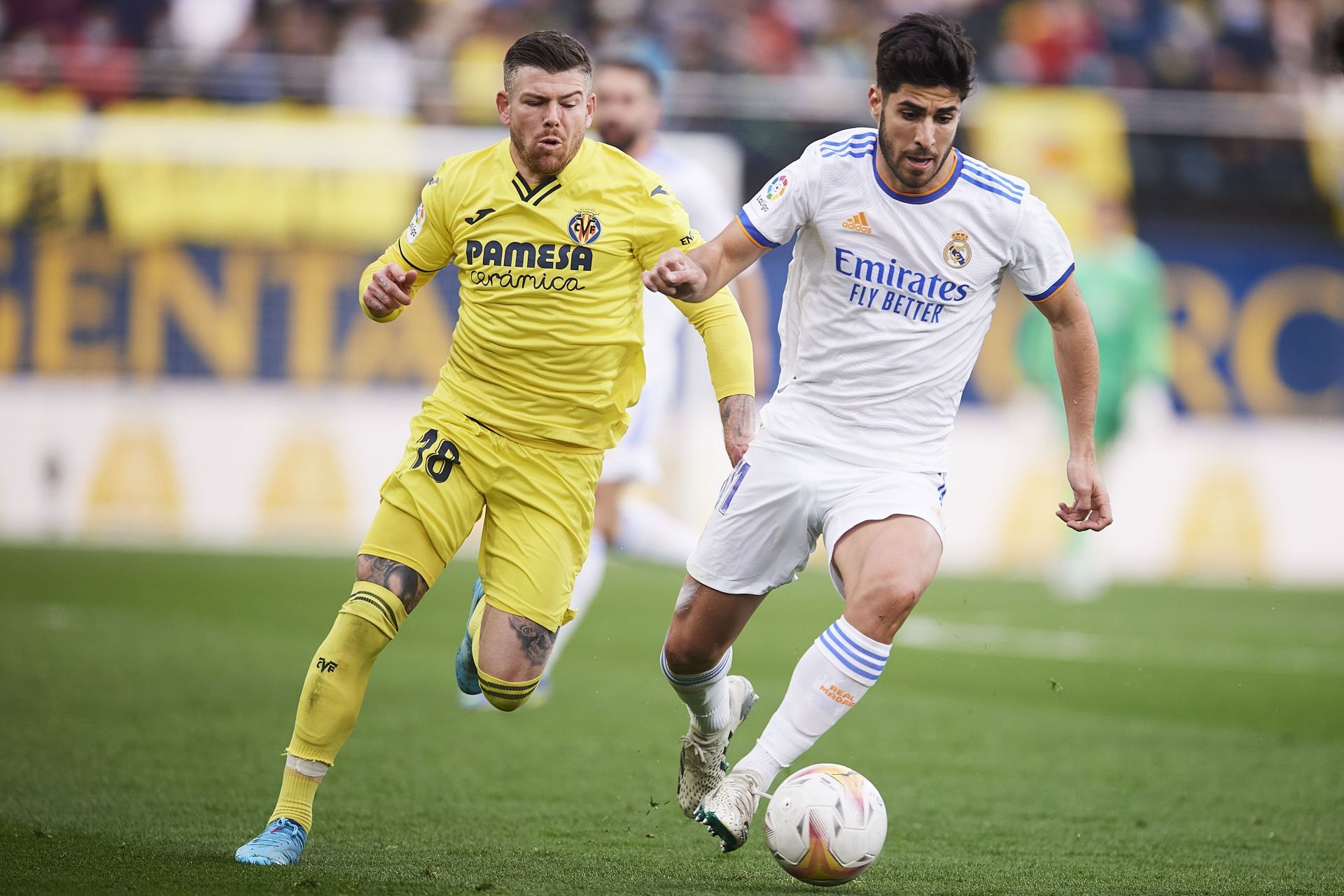 Marco Asensio (right) could extend his stay at the Santiago Bernabeu.