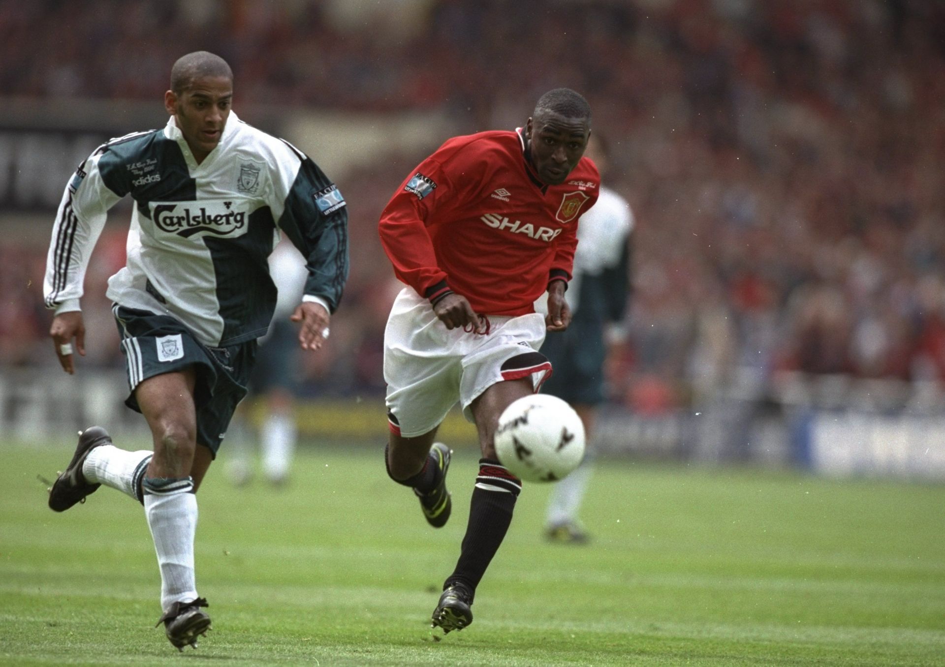 Andy Cole of Manchester United and Phil Babb of Liverpool.