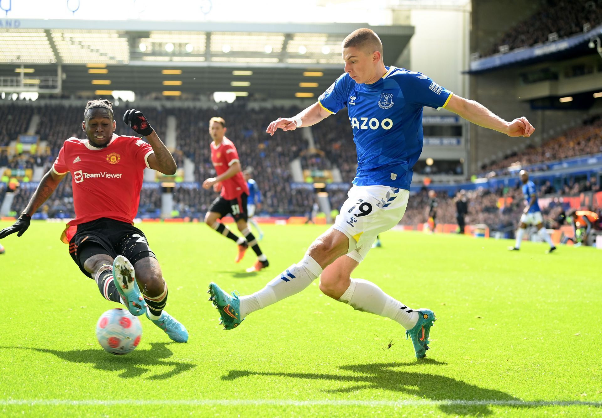 Aaron Wan-Bissaka makes a block.