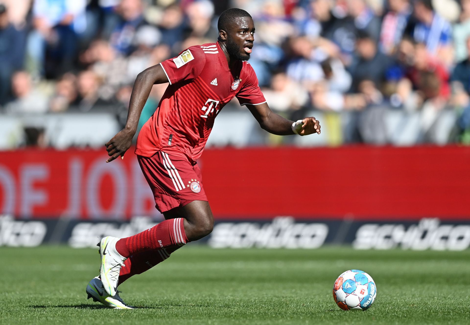 Dayot Upamecano carries the ball up the pitch.