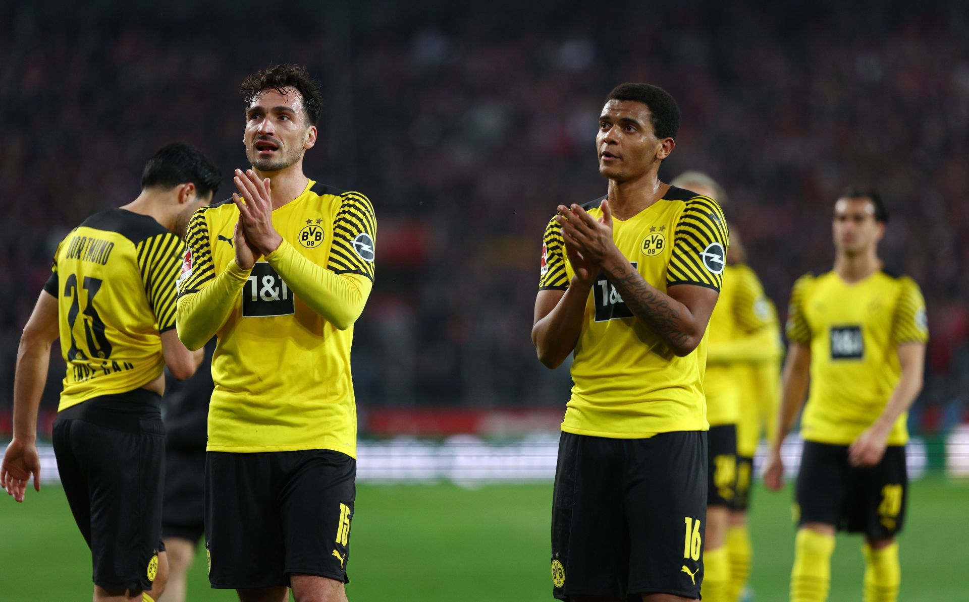 Manuel Akanji (right, #16) will lead Dortmund's defence in the absence of Mats Hummels (left).