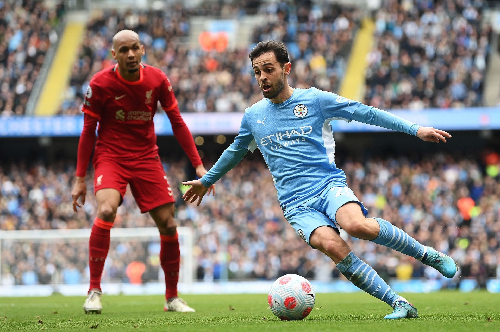 Fabinho and Bernardo Silva in action.