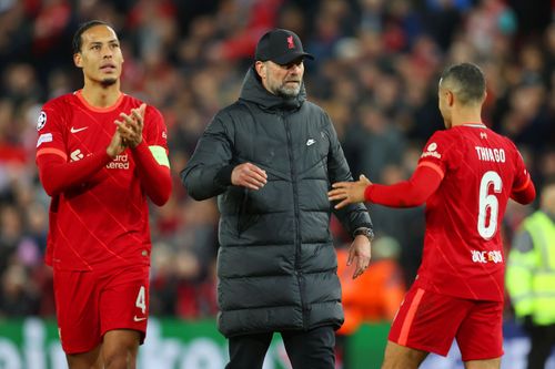 Virgil van Dijk (left), Jurgen Klopp (center) and Thiago Alcantara (right)