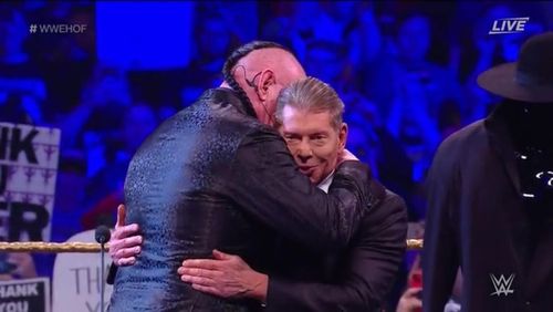 The Chairman of WWE hugging The Undertaker