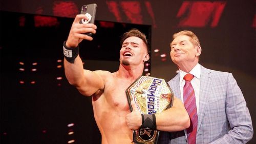 Theory taking a selfie with WWE Chairman Vince McMahon