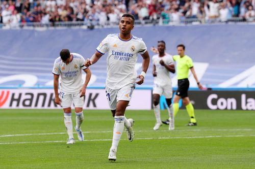 Rodrygo celebrates after scoring a goal.