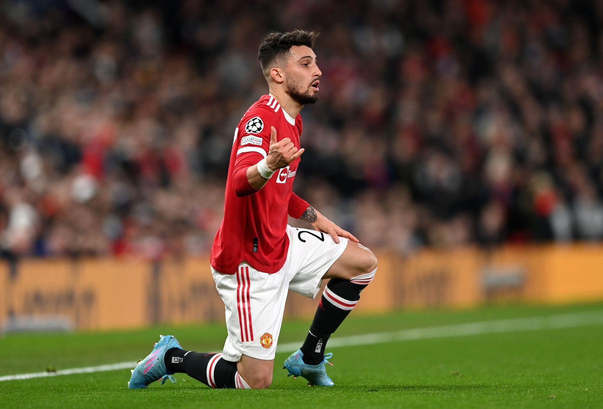 Alex Telles in action against Atletico Madrid in the Champions League