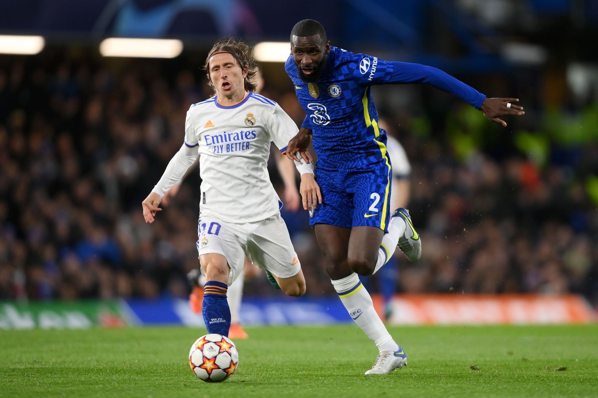 Antonio Rudiger (#2) vies with Luka Modric (#10)