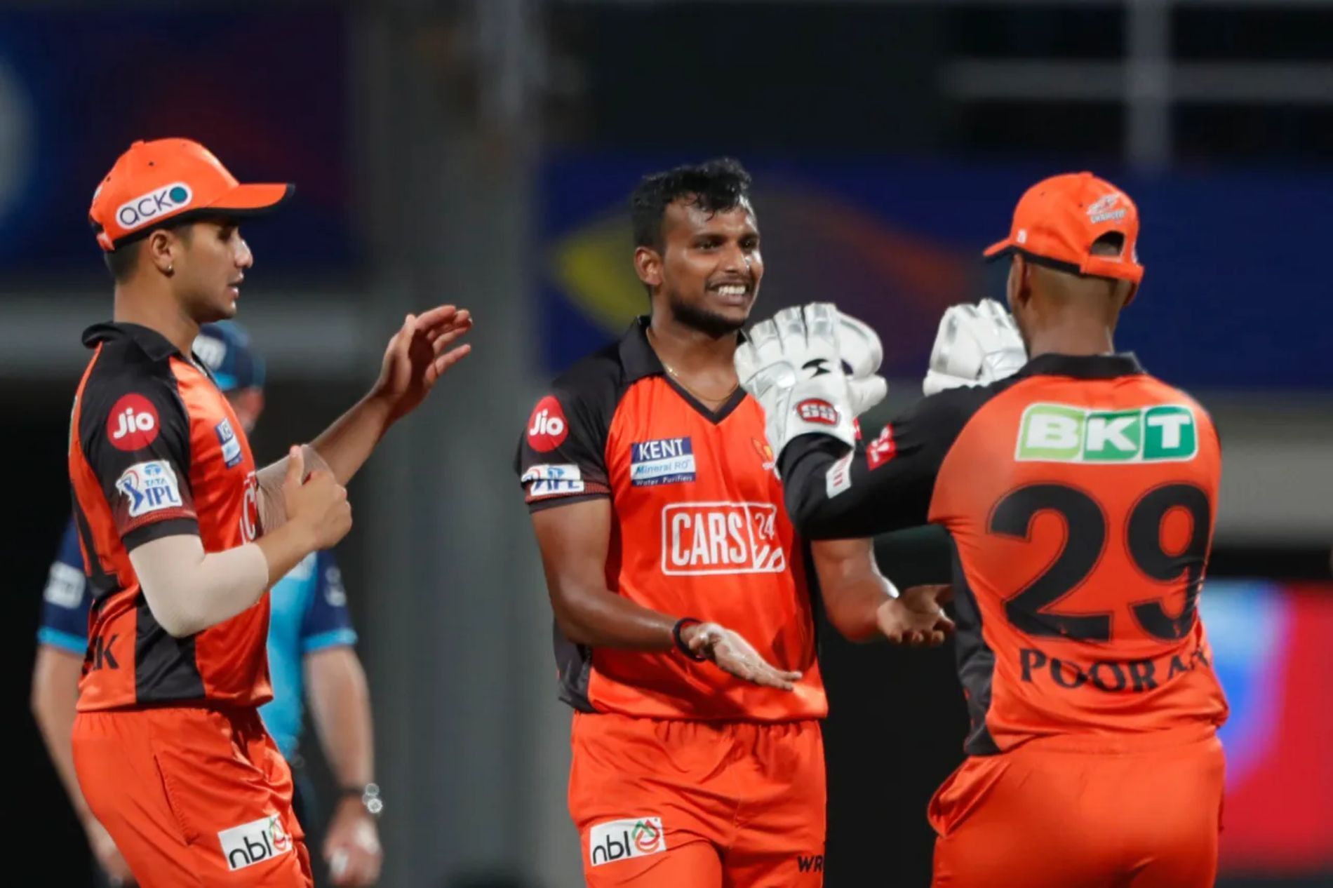 T Natarajan celebrates a wicket with teammates. Pic: IPLT20.COM