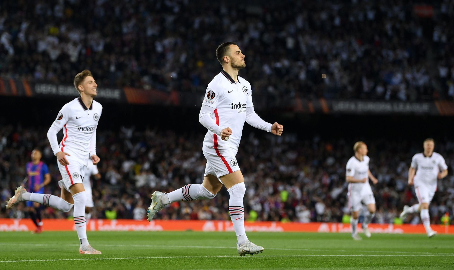 Kostic celebrates after sending Ter Stegen the wrong way