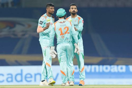 K Gowtham (left) with Quinton de Kock and LSG skipper KL Rahul. Pic: IPLT20.COM