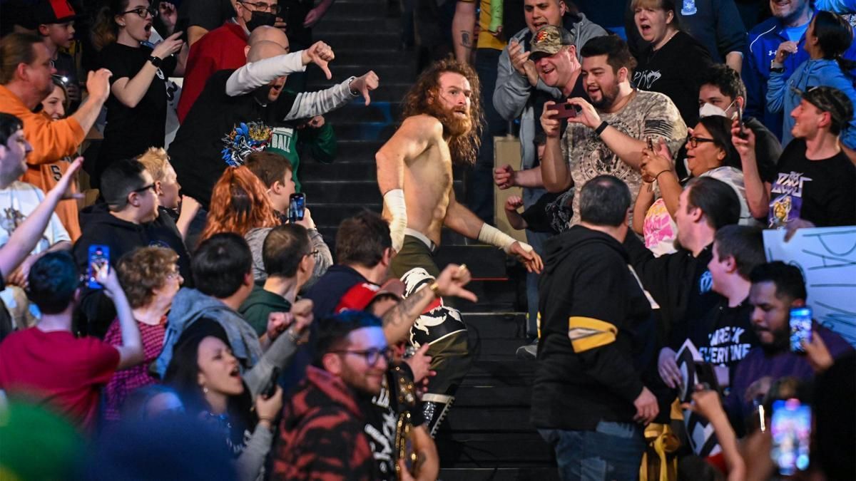 Sami Zayn ran away from Drew McIntyre