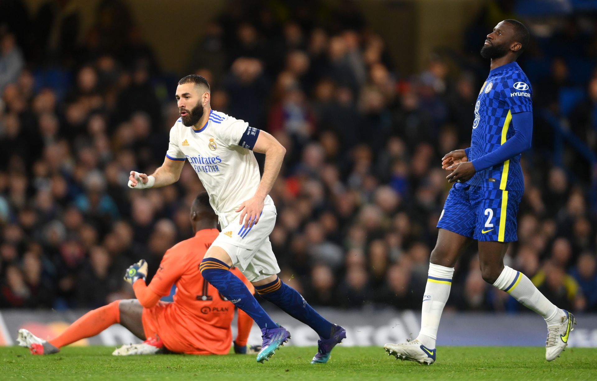 Real Madrid&#039;s Karim Benzema (C) celebrates his third goal against Chelsea