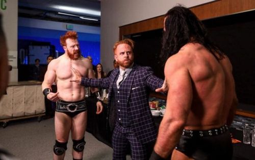 Pat Buck between Sheamus and Drew McIntyre