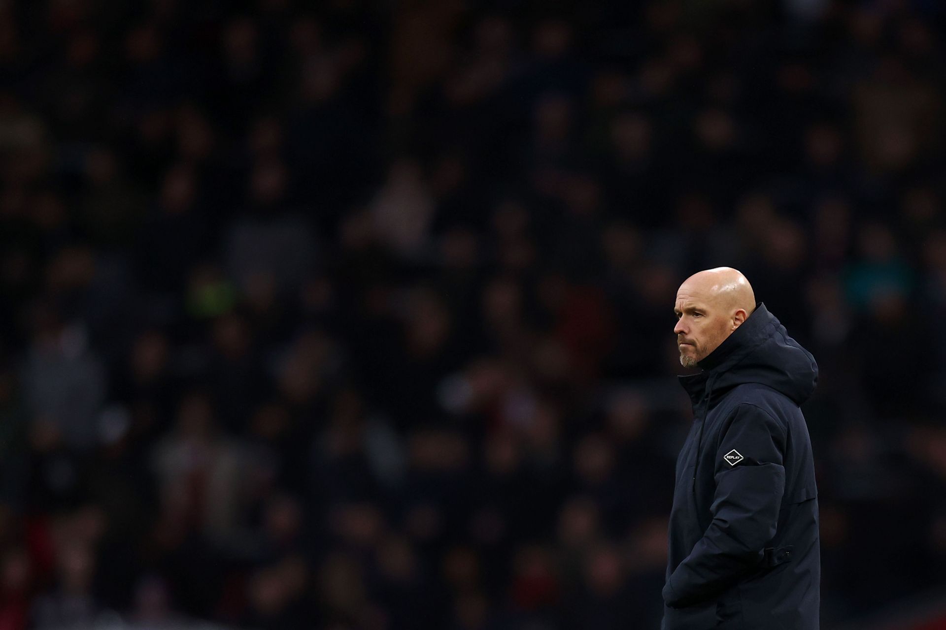 Erik ten Hag looks on during a game.