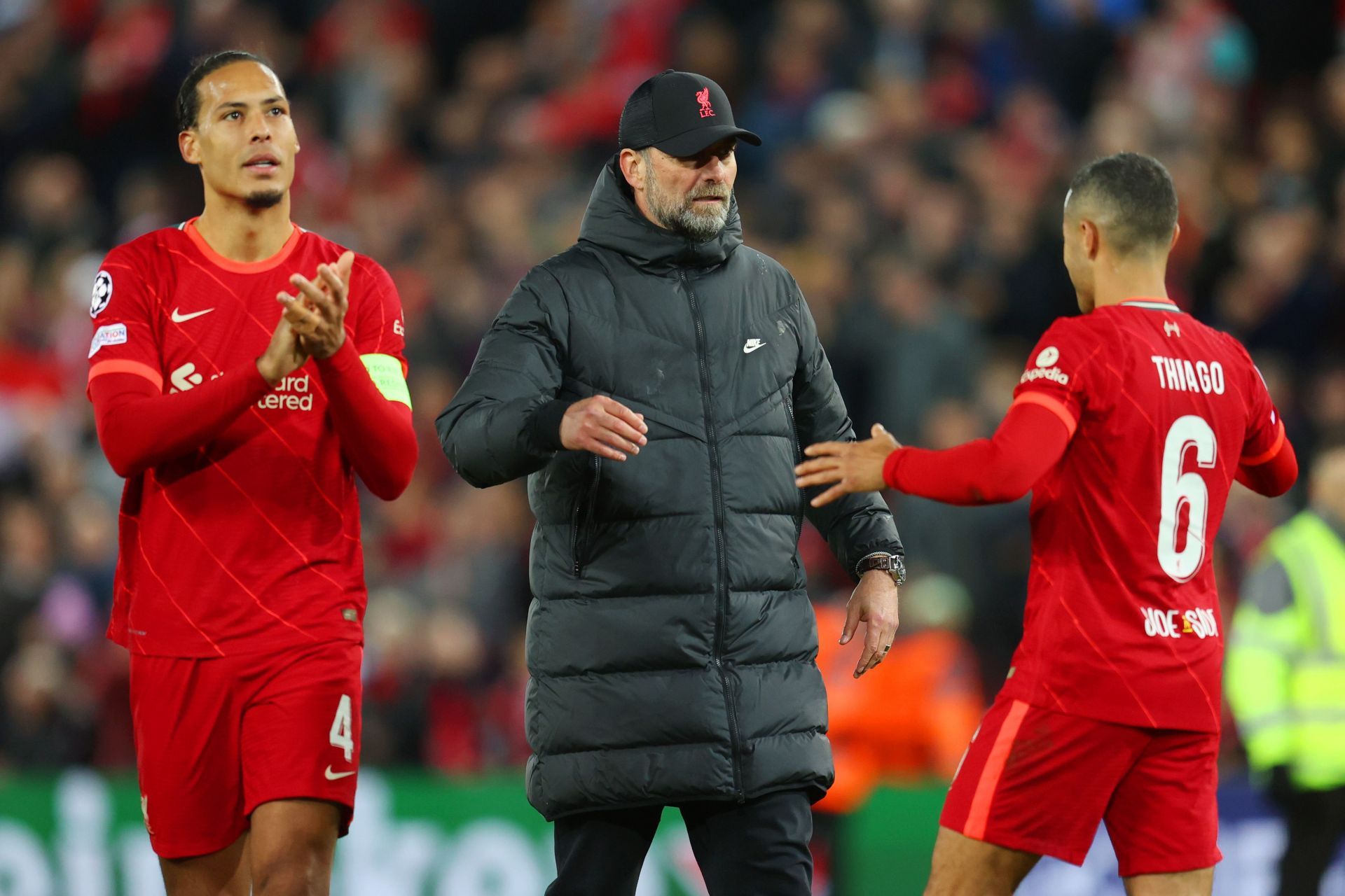 Thiago celebrates with Jurgen Klopp.