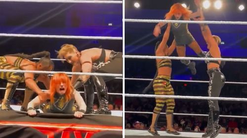 Bianca Belair and Rhea Ripley execute a double-team move on Becky Lynch