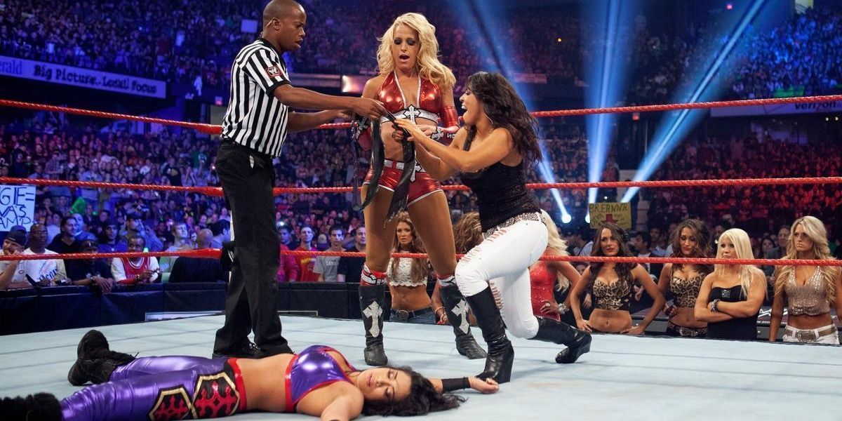 Michelle McCool and Layla (LayCool) celebrating their victory.