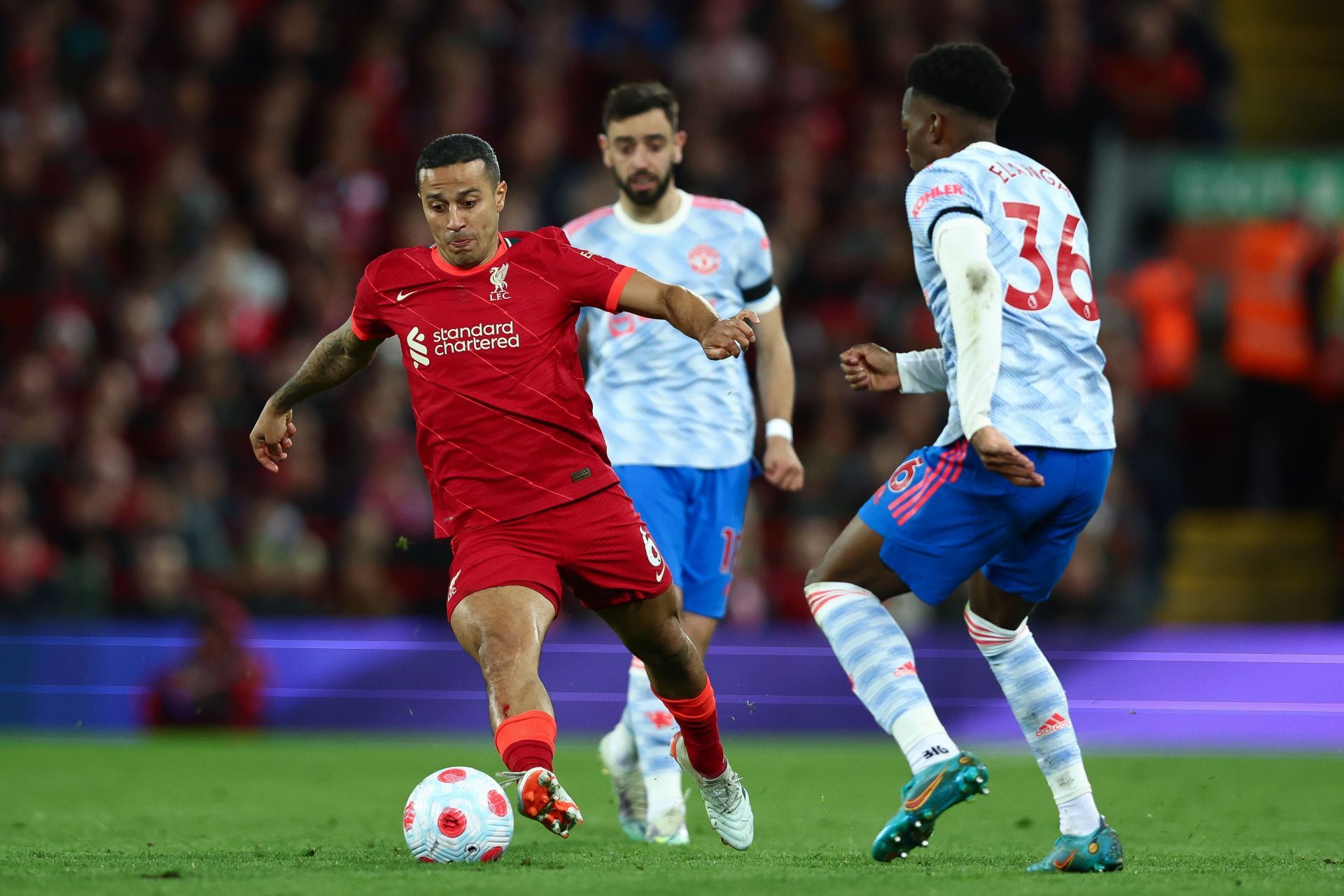 Thiago in action against Manchester United.