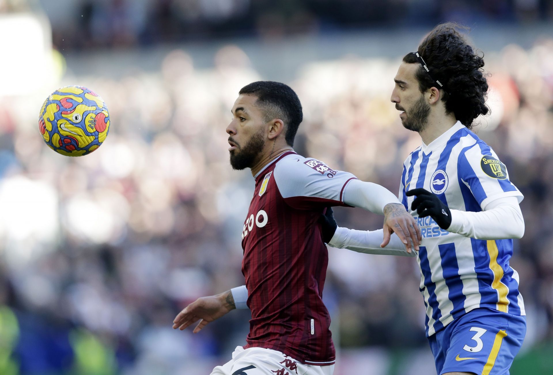 Douglas Luiz (left) is wanted at the Emirates.