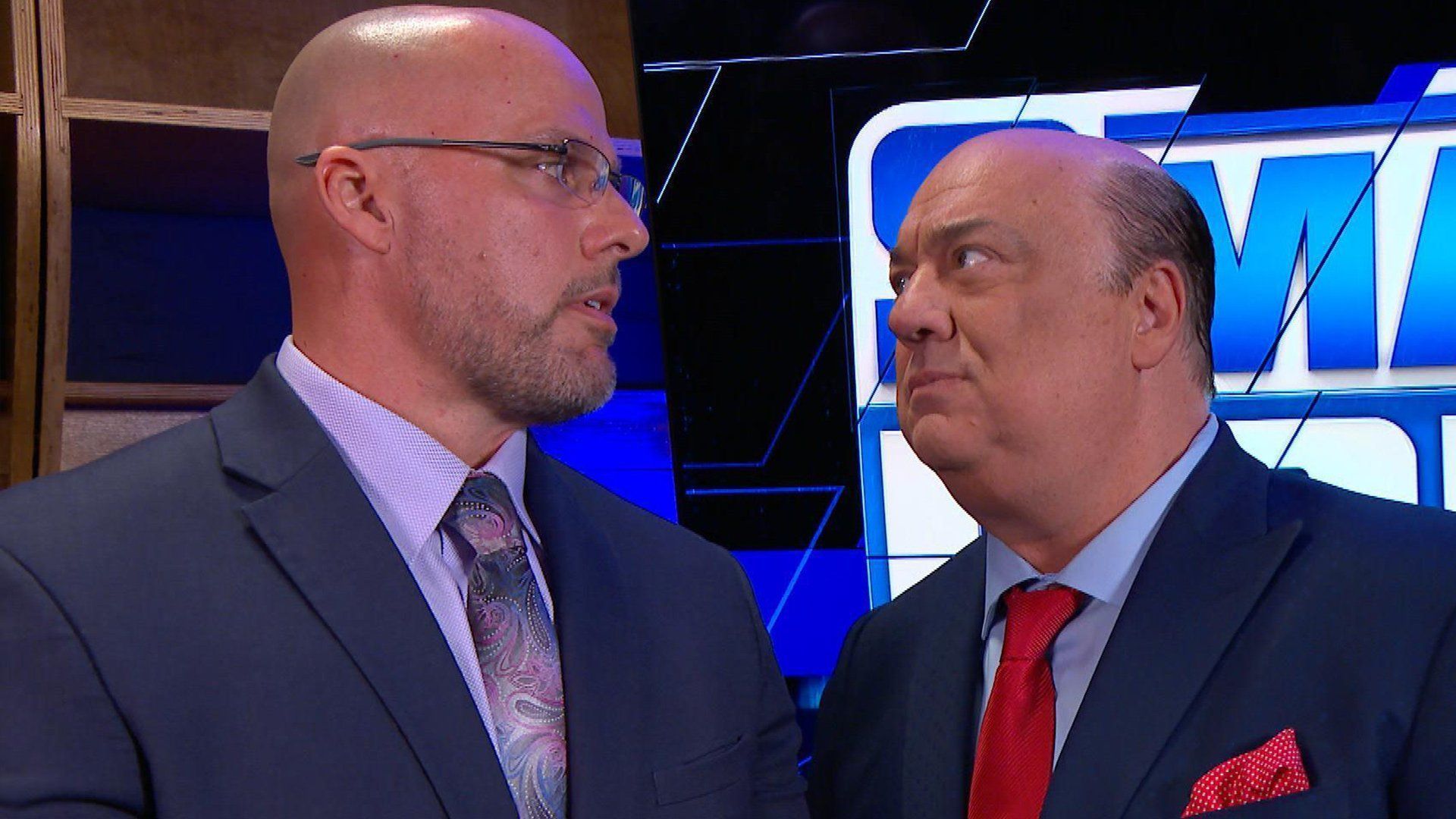 Adam Pearce with Paul Heyman