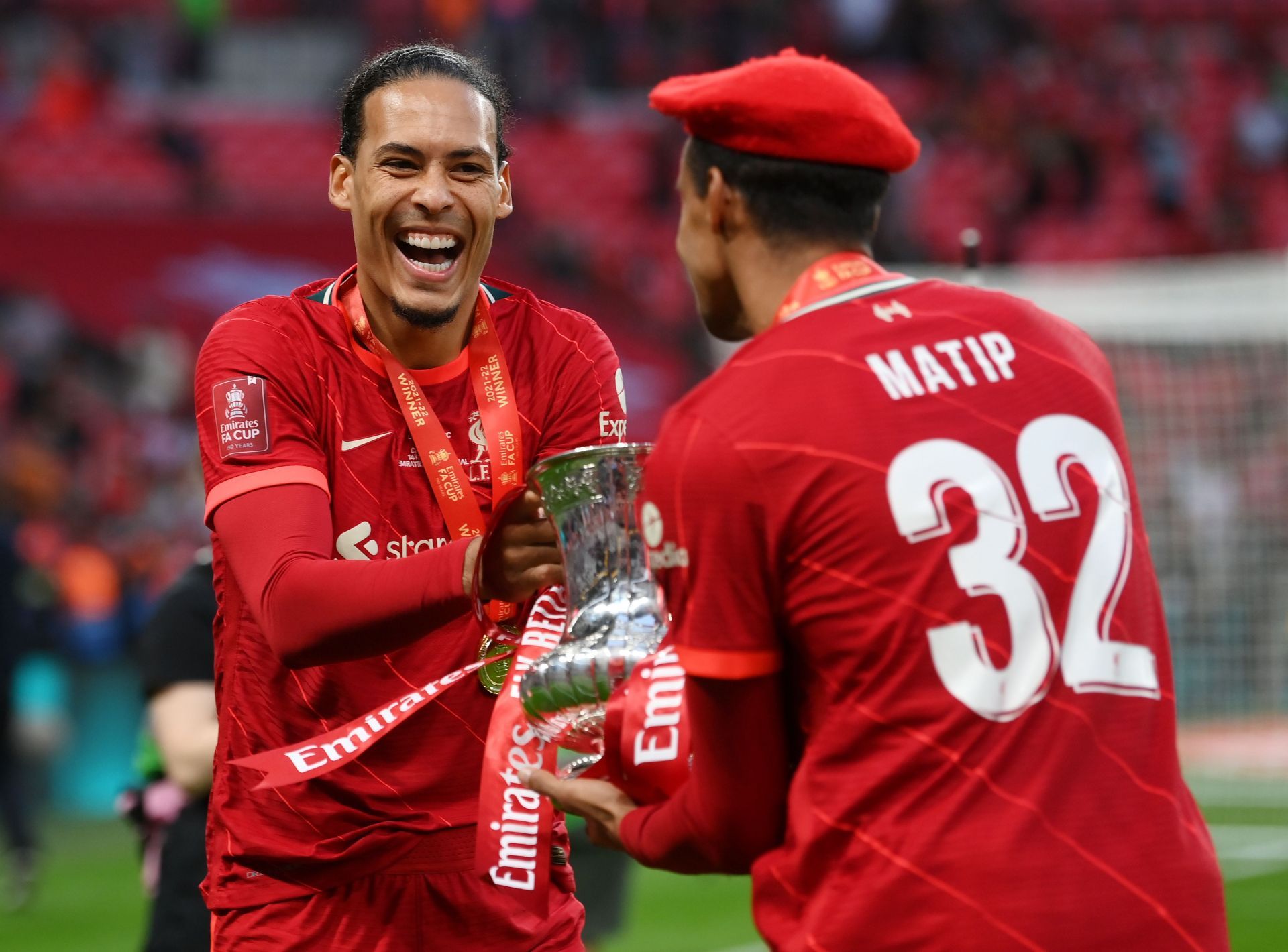 Virgil van Dijk celebrates with Joel Matip.